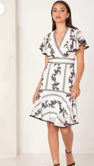 Belted Embroidered dress  new and never worn - Picture 1 of 3